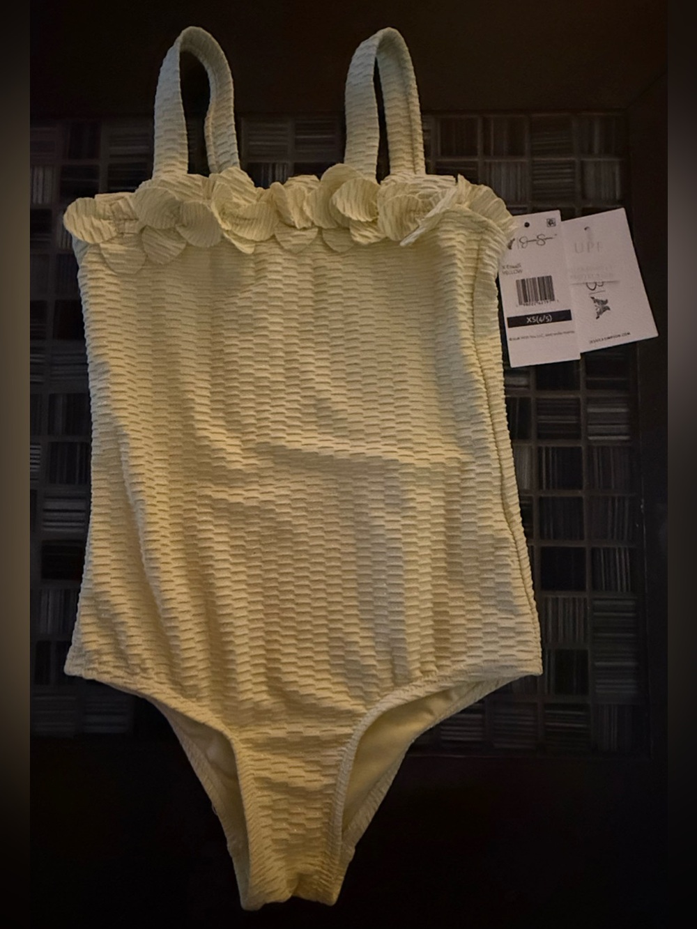 Jessica Simpson Pale Yellow Textured Girls' One-Piece Swimsuit with Floral Trim.